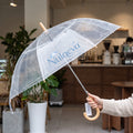 Nulqeva™ Clear Bubble Umbrella with Natural Wood J-Handle – Windproof Transparent Dome Rain Umbrella for Weddings, Commute &amp; Daily Style